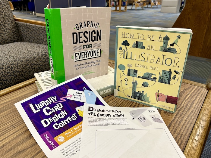 library card design contest entry form and books