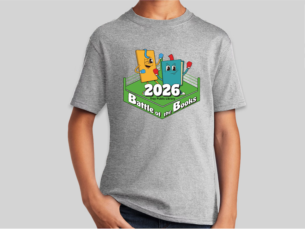 Young boy standing cropped to show only grey Battle of the Books t-shirt